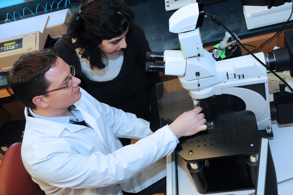 kip connor at a microscope