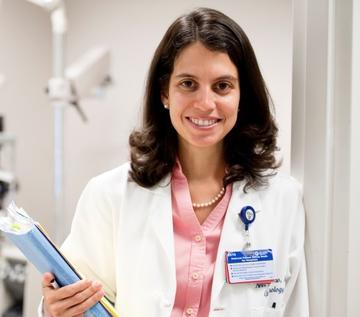 Dr. Lucia Sobrin in an exam room