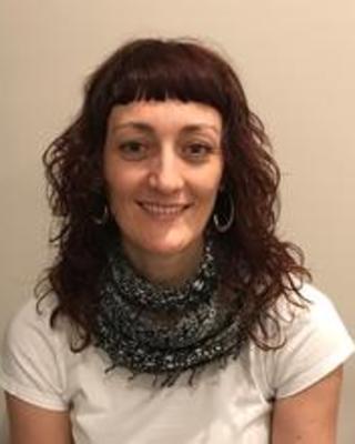 headshot of Rosario Fernandez Godino
