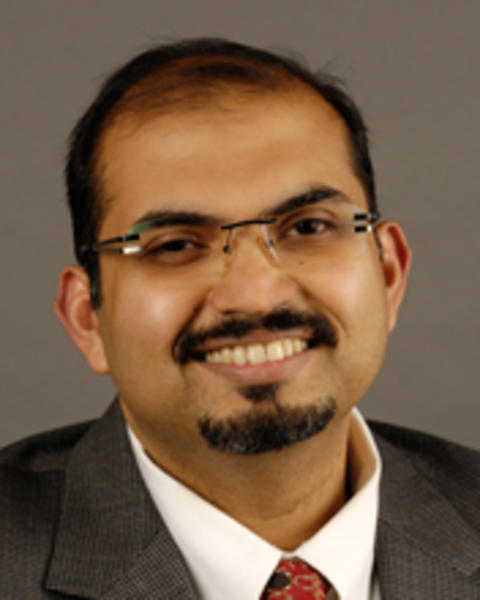 menon_raj_220_x_220.jpg
